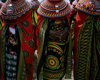 untitled, samburu women, kalama community conservancy, northern kenya - with butterflies and warriors III - David Chancellor