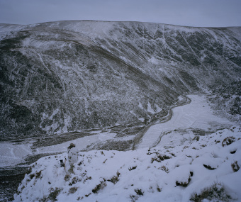 The 'keeper' in snow shoot at mid winters point, checks his beat, on Invermark, Cairngorm National Park, Scotland - land - David Chancellor
